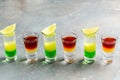 Variation of hard alcoholic shots. alcoholic cocktail drinks shot with lime