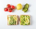 Variation of healthy breakfast sandwiches with avocado and toppings on white background. Food concept