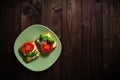 Variation of healthy toasts with cream cheese on a plate. Delicious sandwiches. Food composition, tasty Italian meal. Top view,