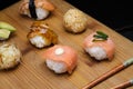 Sushi Set sashimi and rolls served on wooden desk Royalty Free Stock Photo