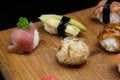 Sushi Set sashimi and rolls served on wooden desk Royalty Free Stock Photo