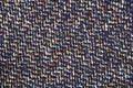 Varicolored tweed like texture, varicolored wool pattern, textured melange upholstery fabric background copy space. Royalty Free Stock Photo