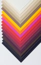 A varicoloured designer cardboard is decomposed by