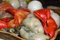 Varied assortment of pickles like red peppers stuffed with cabbage
