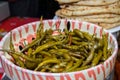 Varied assortment of pickles like red peppers stuffed with cabbage