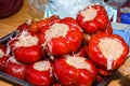 Varied assortment of pickles like red peppers stuffed with cabbage
