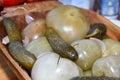 Varied assortment of pickles like red peppers stuffed with cabbage