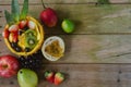 Varied fruits on rustic wooden background. Flat lay