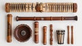 A varied set of wooden musical instruments neatly arrayed on a white background Royalty Free Stock Photo