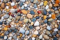 varied sized pebbles scattered on dirt