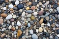 varied sized pebbles scattered on dirt