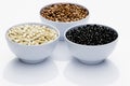 Varieties of beans in bowls, white background Royalty Free Stock Photo
