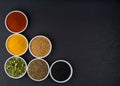 A variety of Asian spices in ceramic bowls top view Royalty Free Stock Photo