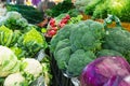 Variety Assortment of Fresh Ripe Organic Vegetables at Farmers Market. Broccoli Cabbage Radish Lettuce Herbs Scallions Zucchini