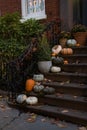 Beautiful Autumn Pumpkin Display on the Stairs to the Entrance of an Old Brownstone Home in Greenwich Village Royalty Free Stock Photo