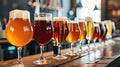 Assorted Beer Glasses Lined on Bar Counter Royalty Free Stock Photo