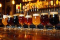Assorted Beer Glasses Arranged on Bar Counter Royalty Free Stock Photo