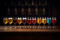 Variety of beer glasses on wooden table, vibrant colors and textures for brewery or pub concept Royalty Free Stock Photo