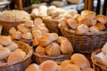 variety of bread rolls in baskets on buffet table Royalty Free Stock Photo