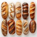 Variety of bread types displayed on a white surface for a cuisinethemed event Royalty Free Stock Photo