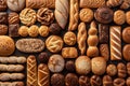 variety of breads, rolls and pastries with different decorative shapes and patterns