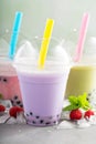 Variety of bubble tea in plastic cups