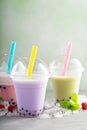 Variety of bubble tea in plastic cups Royalty Free Stock Photo