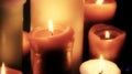 Variety candles burn in darkness stock photo