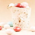 Variety of chocolate eggs in milk jar Royalty Free Stock Photo