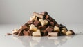 Assorted Gourmet Chocolate Pieces with Hazelnuts Royalty Free Stock Photo