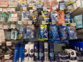 Variety choice of man`s shaving products health care on displayed for sale at supermarket. Gillette razor and shaving gel