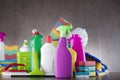 Variety cleaning products on gray background. Royalty Free Stock Photo