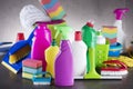 Variety cleaning products on gray background. Royalty Free Stock Photo