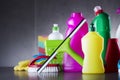 Variety cleaning products on gray background. Royalty Free Stock Photo