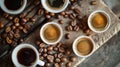 Variety of coffee cups and beans on a rustic table Royalty Free Stock Photo