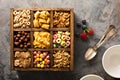 Variety of cold cereals in a wooden box overhead Royalty Free Stock Photo