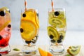 Variety of cold lemonade with fruit and berries Royalty Free Stock Photo