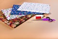 A variety of colored fabrics. Cotton, calico, chintz. Needlework