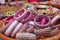 Variety colored handmade bangles are displayed