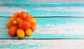 Variety colored of tomato cherry on top wooden table. Tomato cherry is packed with vitamin C, a cherry tomato boosts immunity and