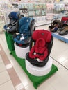 Variety of colorful baby carrier cot or basket is exhibited on display and sale