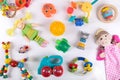 Variety of colorful baby toys on white. top view Royalty Free Stock Photo
