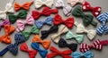 A variety of colorful bow ties are arranged on a flat surface. The collection includes Royalty Free Stock Photo