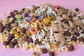 Detail of mixed cereals on pink background Royalty Free Stock Photo