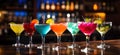 variety of colorful cocktail glasses of bar counter