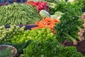 Variety of colorful fresh organic vegetables and greenery on the farmers market stall Royalty Free Stock Photo