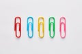 Variety of colorful paper clips in a row Royalty Free Stock Photo