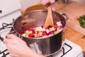 Person Stirring Colorful Vegetables in Metal Pot Royalty Free Stock Photo