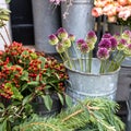 A variety of colors near the Liberty store in London. Large bouquets in tin vases Royalty Free Stock Photo