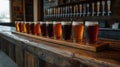 Variety of craft beer samples in rustic brewery setting Royalty Free Stock Photo